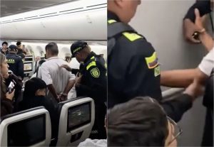 Momentul shocant in care un barbat este ridicat de politisti in avion dupa ce a fost observat facand un gest indececent Incidentul a fost surprins de un martor pe camere
